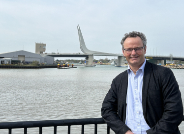 Peter Aldous at the Gull Wing Bridge